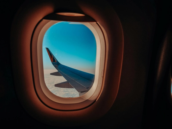 hublot avion départ et ou retour de voyage expatriation